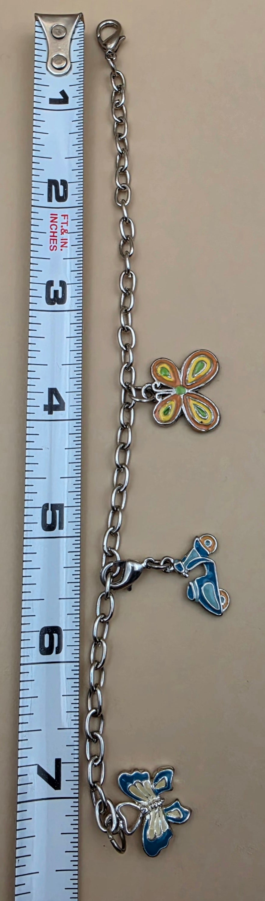 Silvertone/Butterfly/Scooter Charm 7" Bracelet