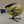 Wooden Hand Carved and Painted Yellow Chickadee Bird with Metal Legs