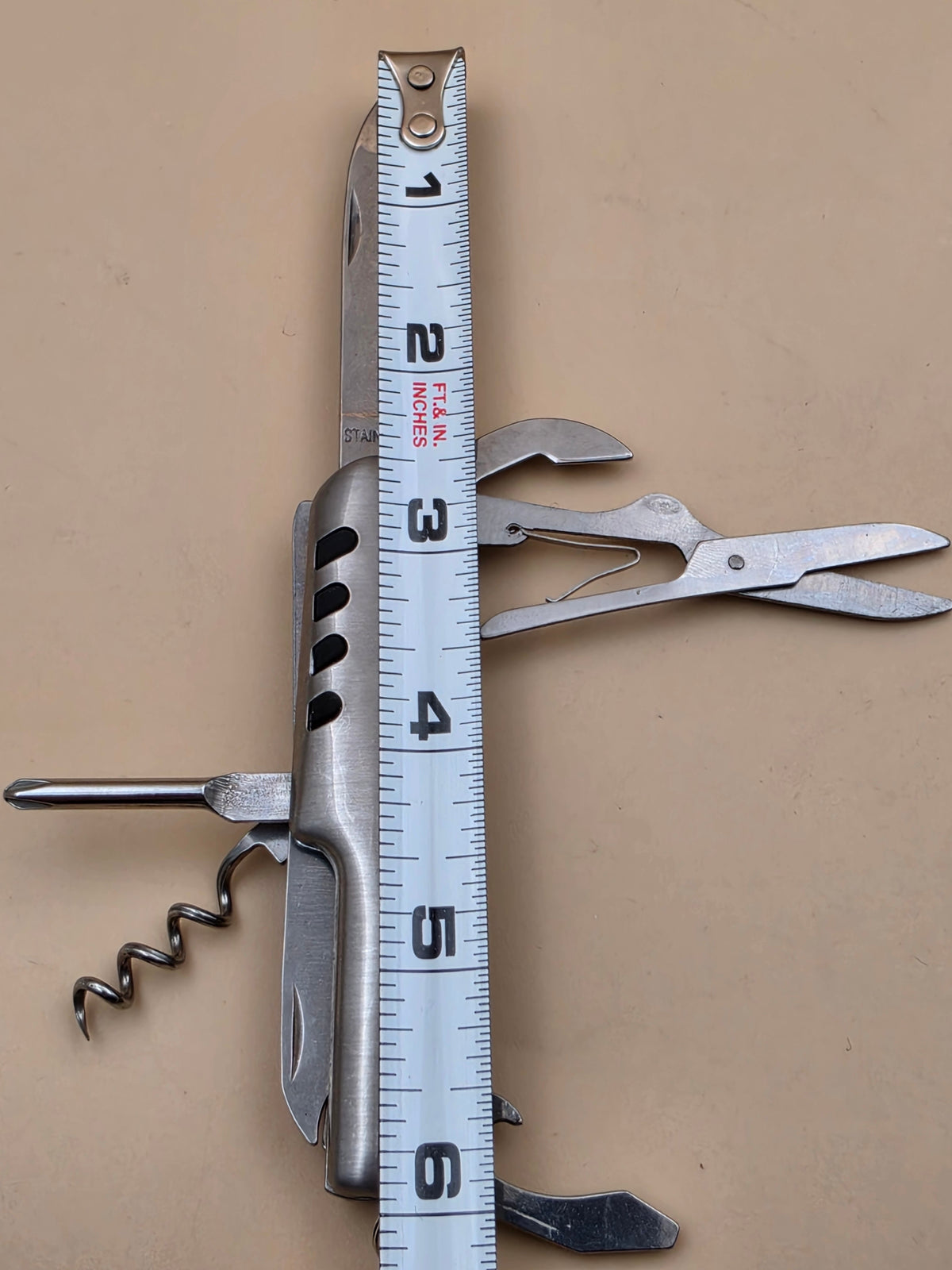 Stainless Steel Multi Use 3.5" Tool/Keychain/ Knife/Scissors/Corkscrew/Flat and Phillips Screwdriver/Nail File/Can Opener