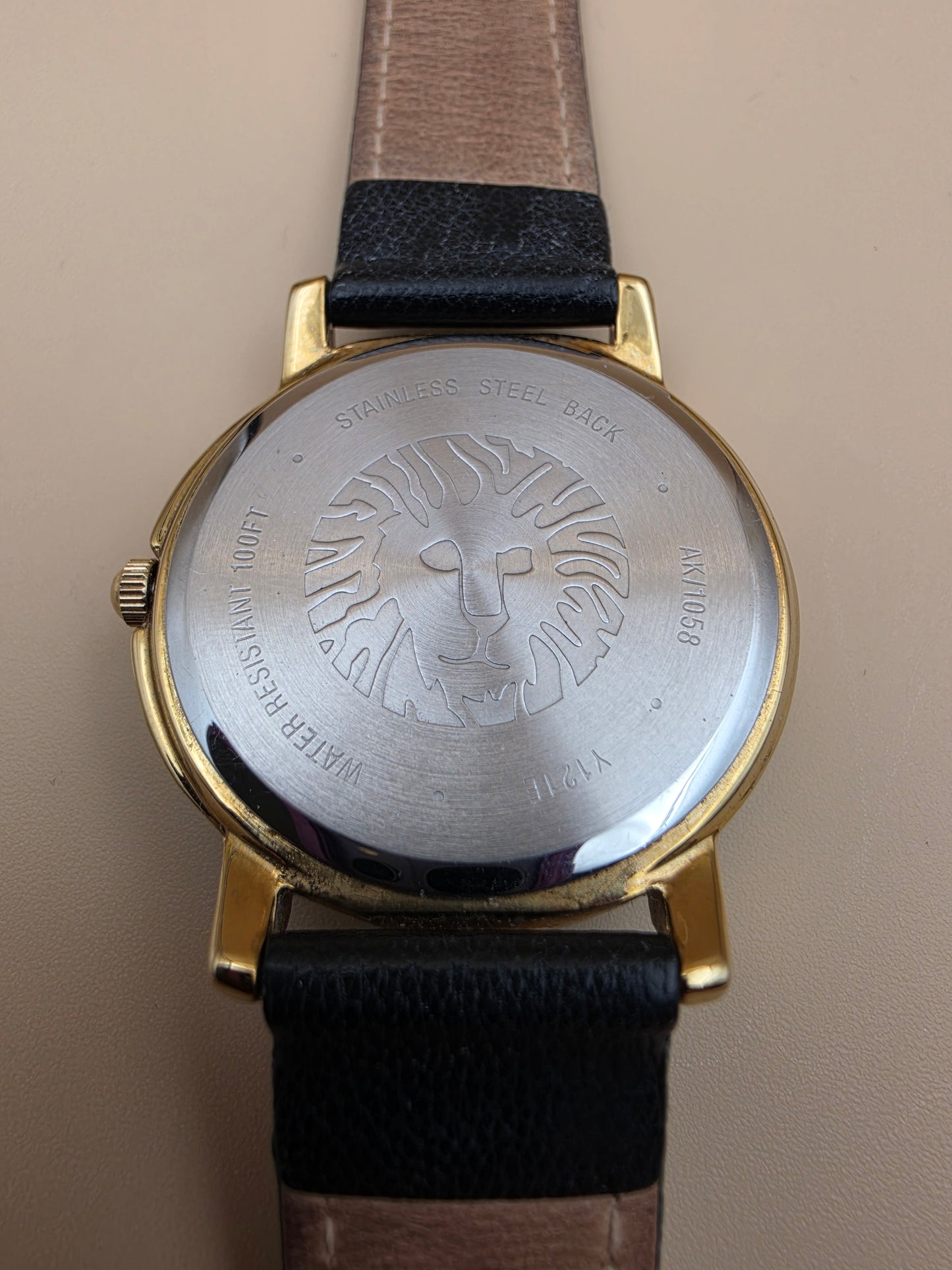 ANNE KLEIN LION LOGO Model 10/1058BKBK Black and Gold Plated Vintage Women's Watch