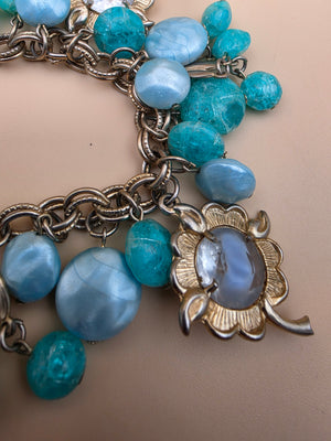 1950's Lucite/Art Glass/Antiqued Gold Tone Stretch Charm Bracelet