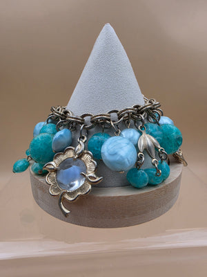 1950's Lucite/Art Glass/Antiqued Gold Tone Stretch Charm Bracelet