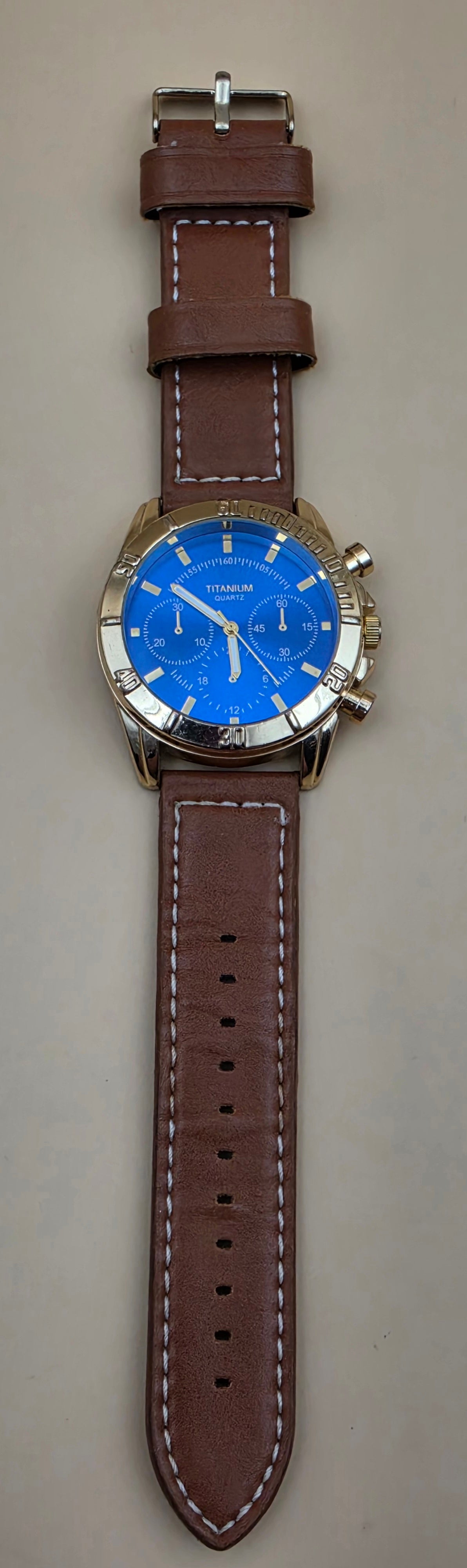 Blue Dial/Goldtone/Brown Stitched Band Men's Watch