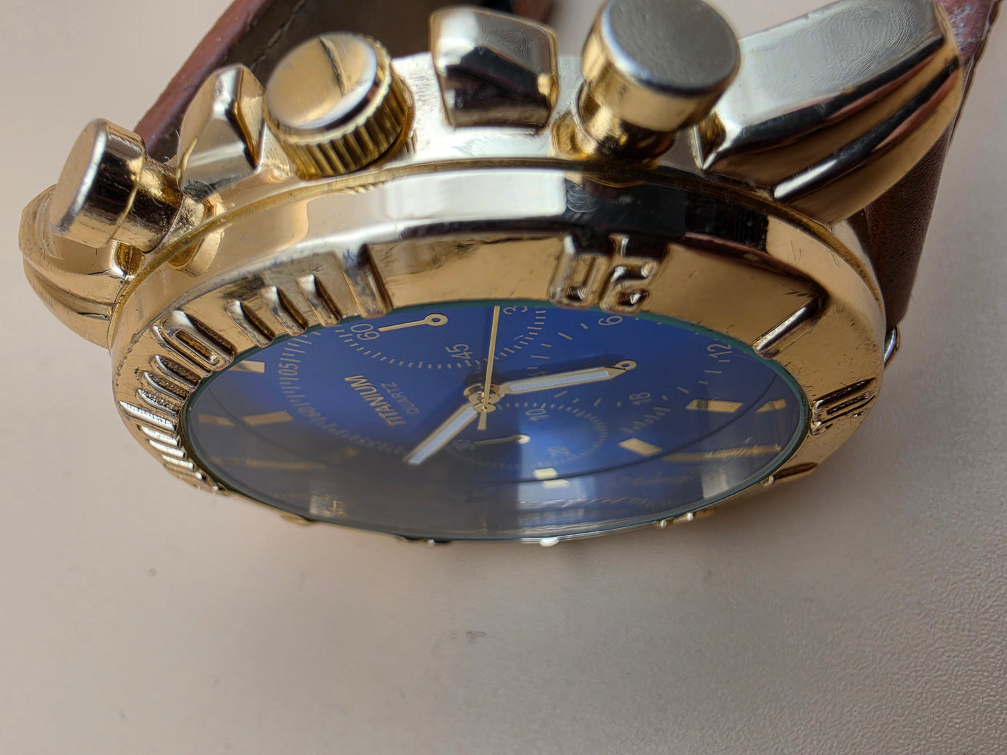 Blue Dial/Goldtone/Brown Stitched Band Men's Watch
