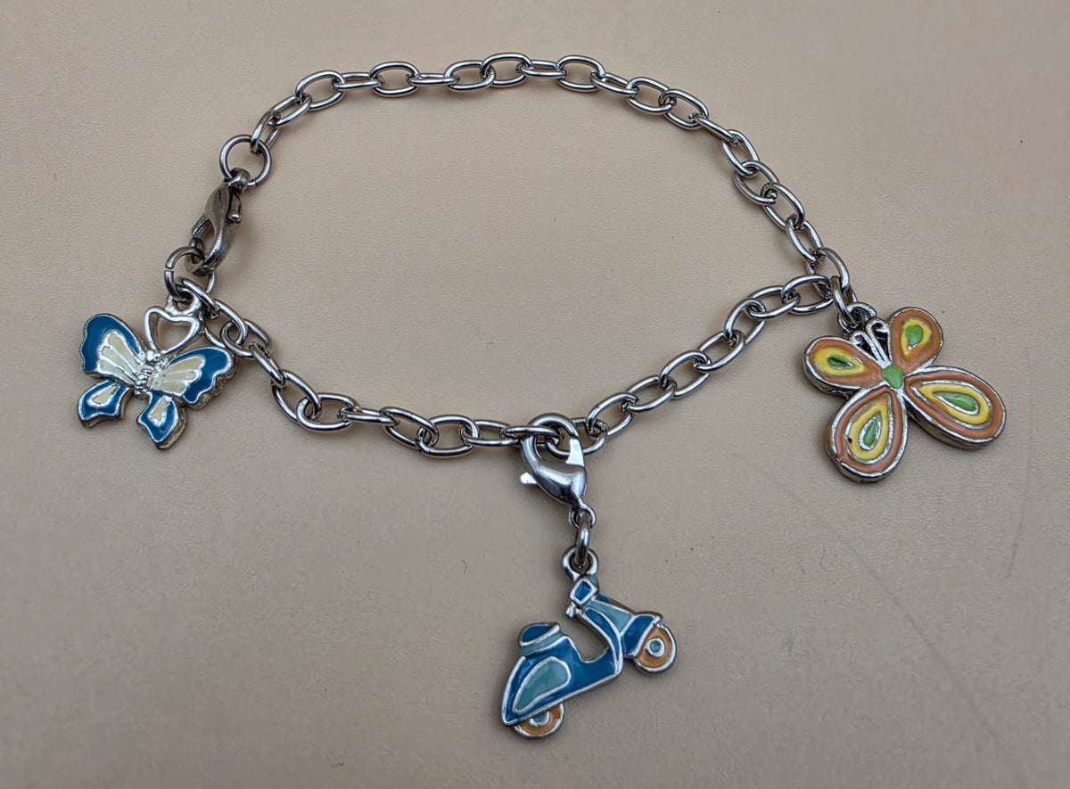 Silvertone/Butterfly/Scooter Charm 7" Bracelet