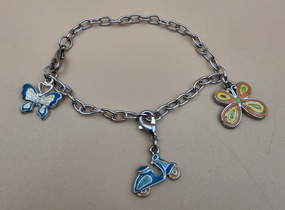 Silvertone/Butterfly/Scooter Charm 7" Bracelet