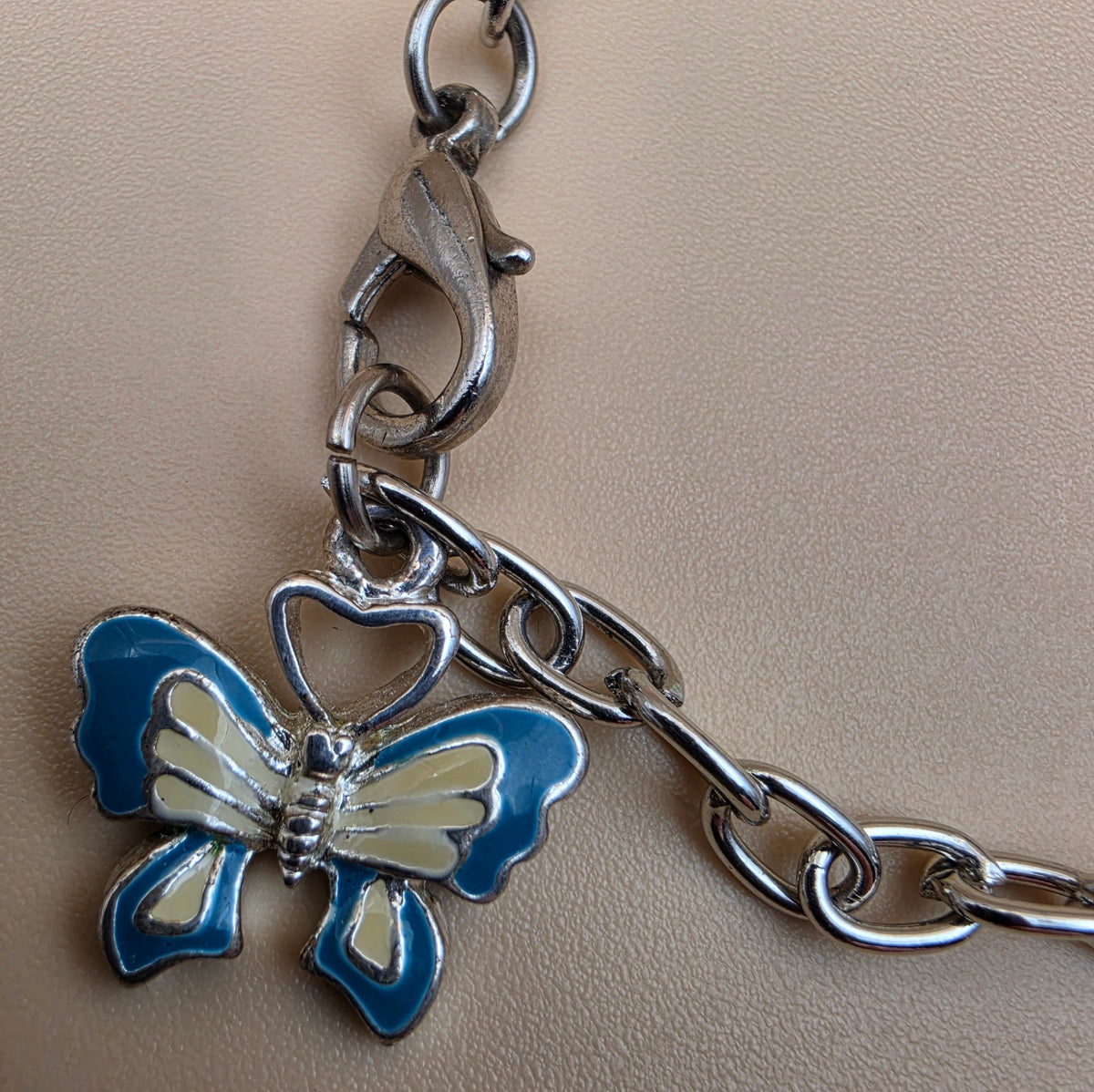 Silvertone/Butterfly/Scooter Charm 7" Bracelet