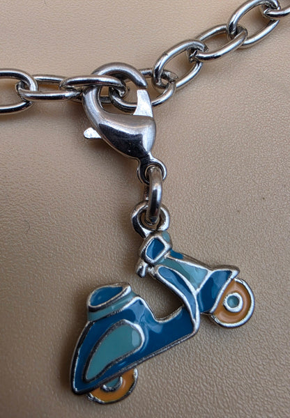 Silvertone/Butterfly/Scooter Charm 7" Bracelet