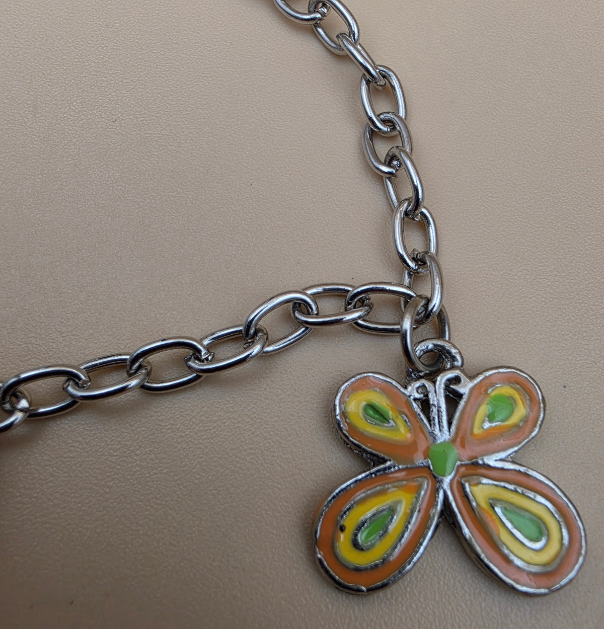 Silvertone/Butterfly/Scooter Charm 7" Bracelet