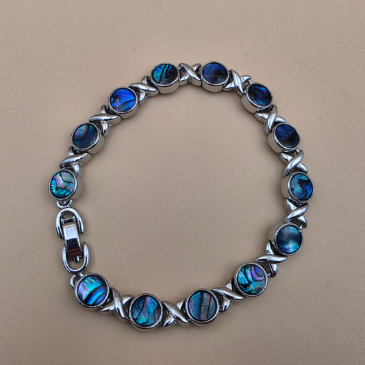 New Zealand Paua Shell/Silvertone XOXO Design 8" Bracelet