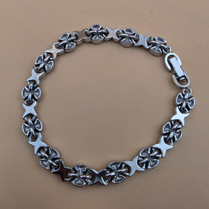New Zealand Paua Shell/Silvertone XOXO Design 8" Bracelet
