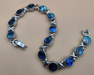 New Zealand Paua Shell/Silvertone XOXO Design 8" Bracelet