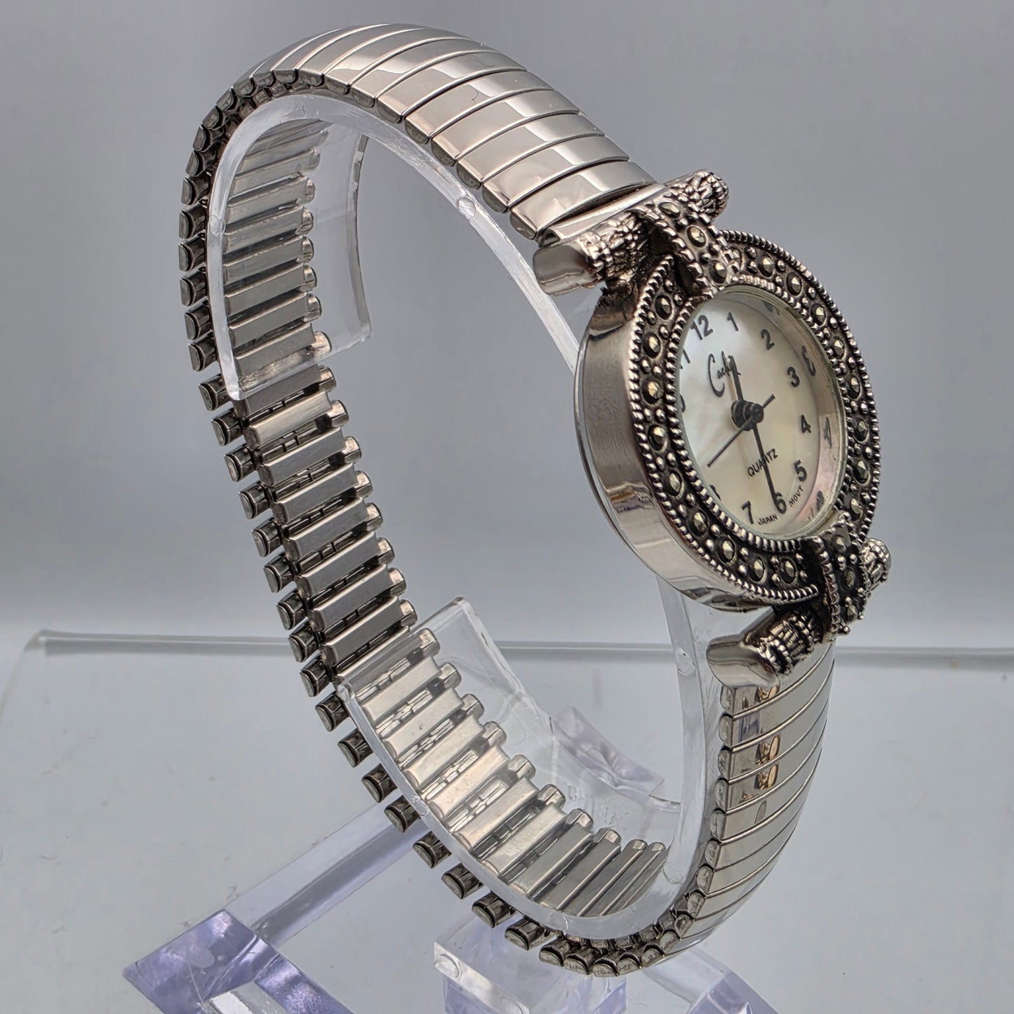 CACHÈ Silver Tone/Marcasite Stretch/Expandable Band Watch