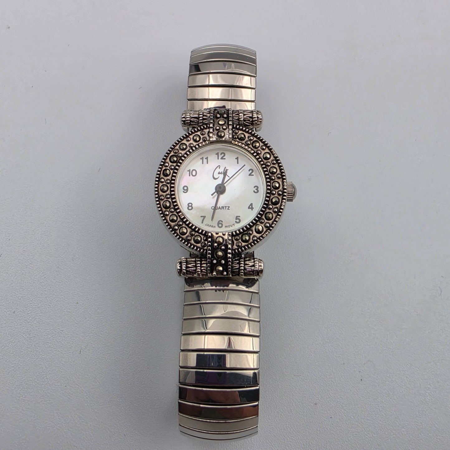 CACHÈ Silver Tone/Marcasite Stretch/Expandable Band Watch