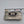 EMPORIUM ARMANI Logo Reversible Belt Buckle