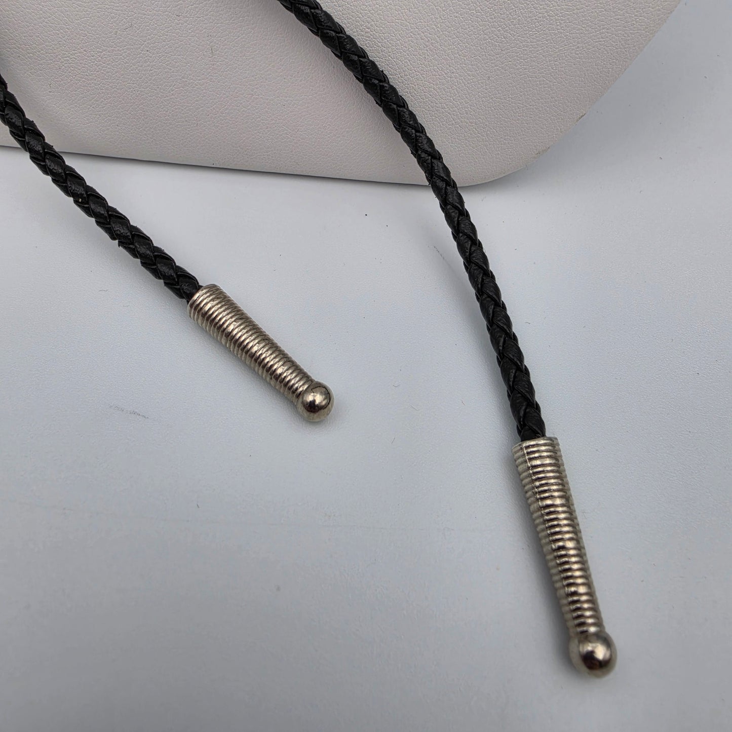 SISKIYOU Pewter Eagle/Black Braided Leather Bolo