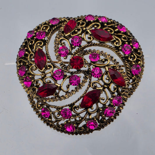 Pink/Red Rhinestone Gold Tone Metal Filagree Vintage 2"  Brooch