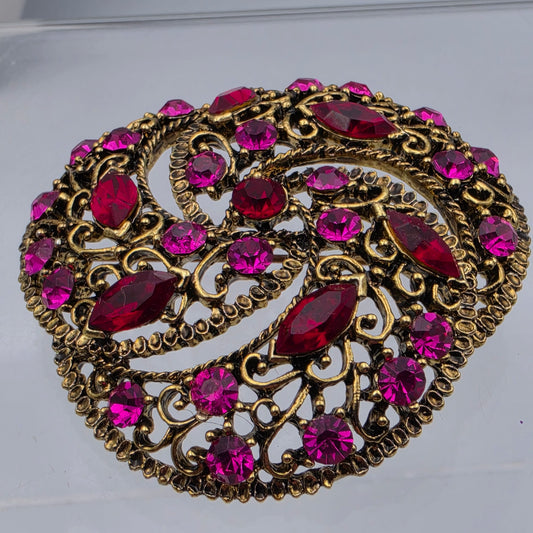 Pink/Red Rhinestone Gold Tone Metal Filagree Vintage 2"  Brooch