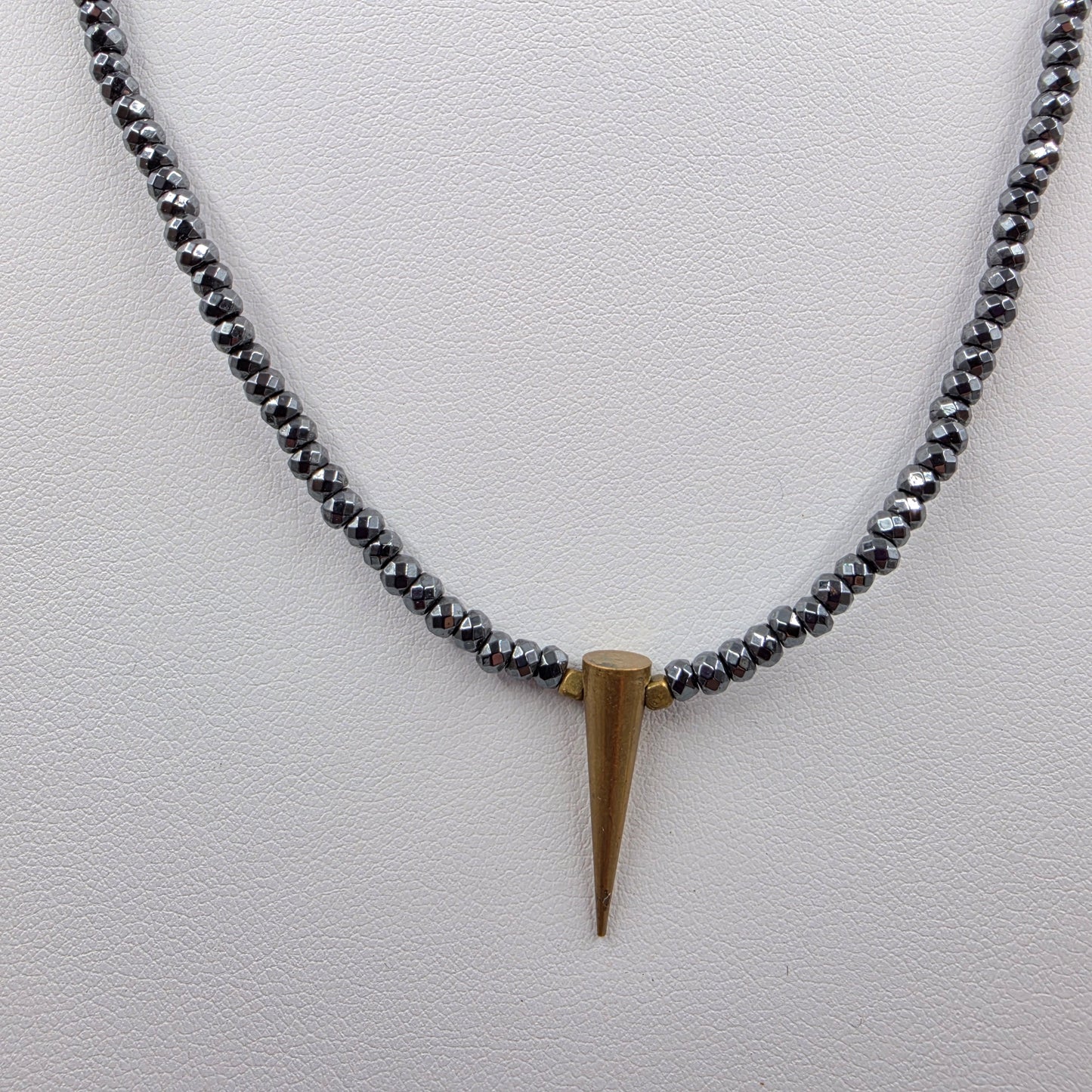 15"-18" Faceted Hematite Bead with Brass Spike Pendant