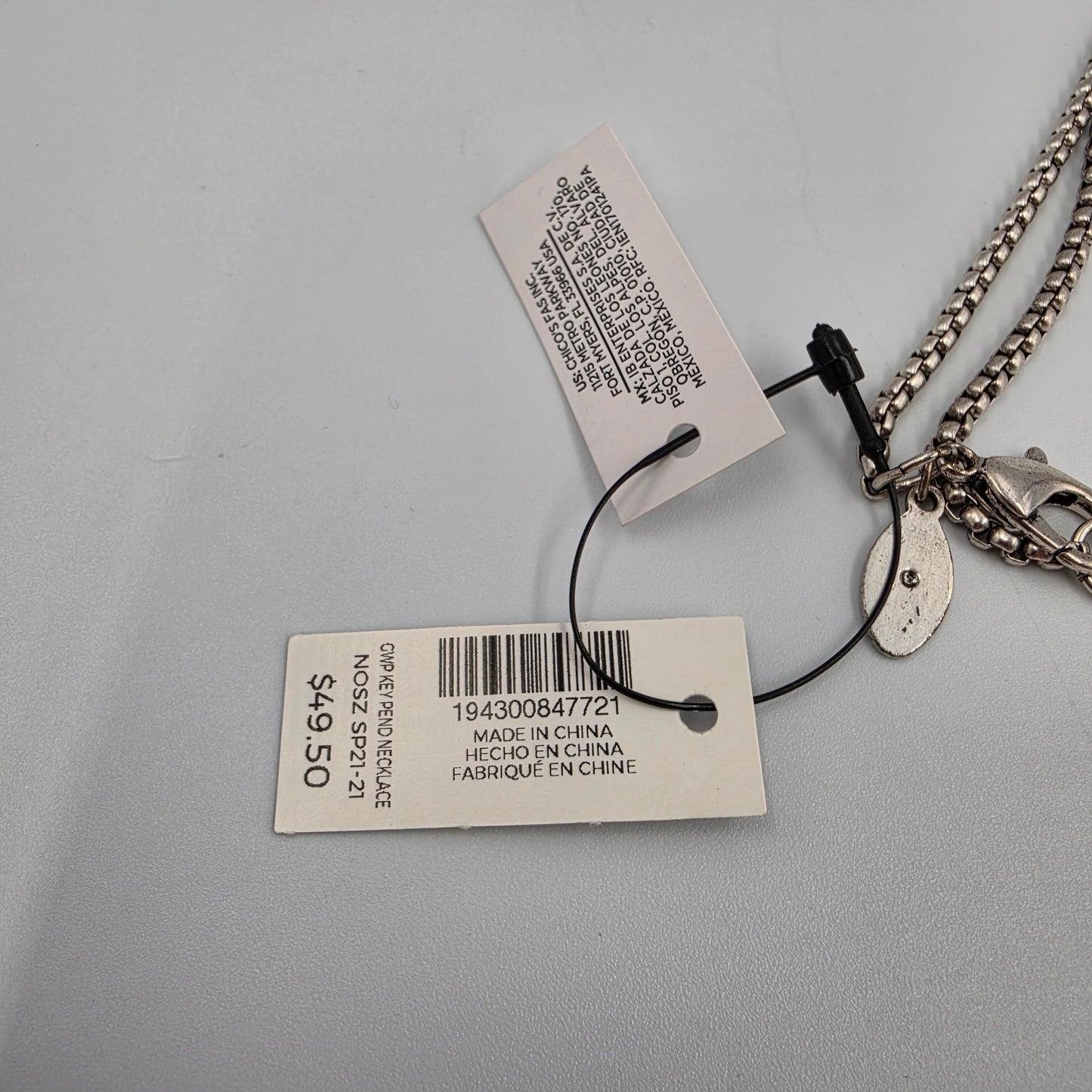 CHICOS Silver Tone 34"-38" Adjustable Clear Rhinestone/Key Necklace