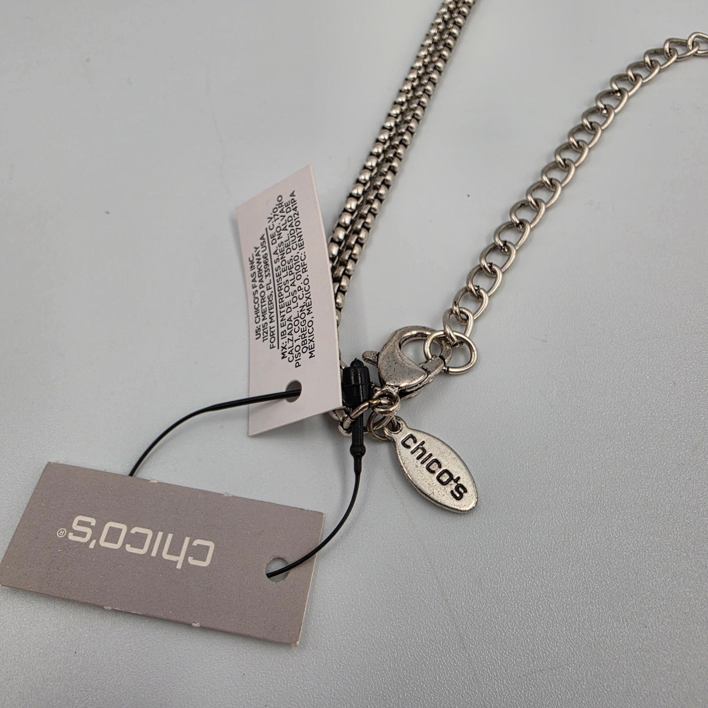 CHICOS Silver Tone 34"-38" Adjustable Clear Rhinestone/Key Necklace