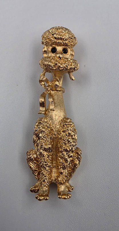 MONET 2.25" Vintage 1960"s-70"s Gold Tone Plated Textured Sitting Poodle With A Detailed Bow And Black Rhinestone Eyes