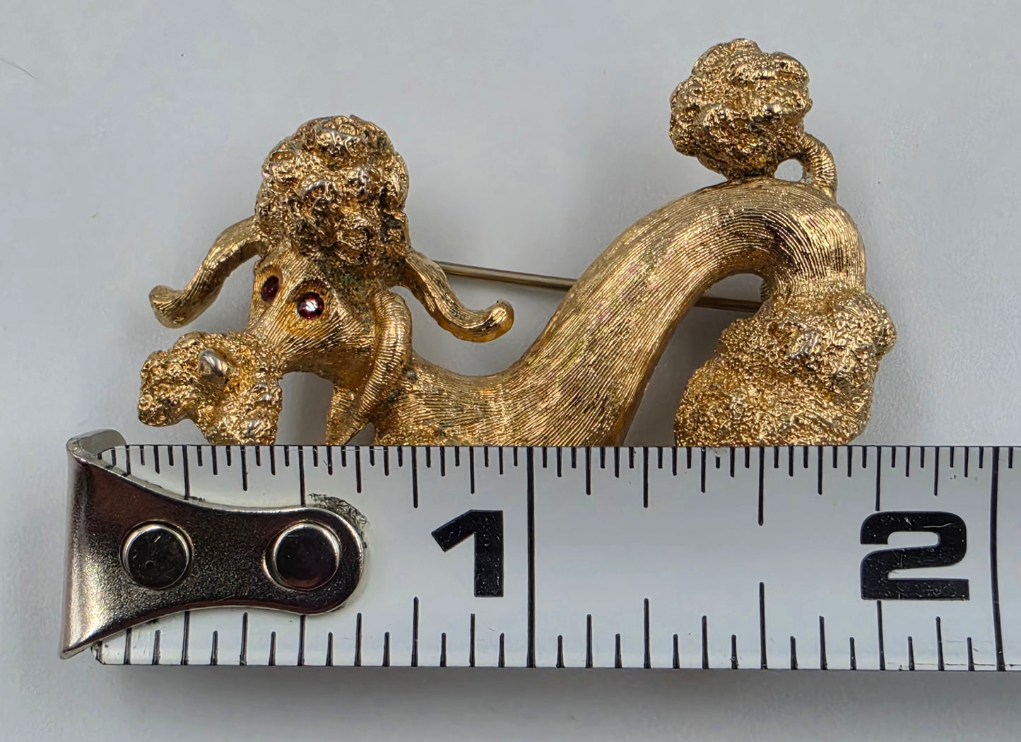 MONET 1.5" Vintage 1960"s-70"s Gold Tone Plated Textured Kneeling Poodle With Red Glass Rhinestone Eyes