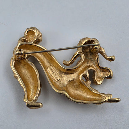 MONET 1.5" Vintage 1960"s-70"s Gold Tone Plated Textured Kneeling Poodle With Red Glass Rhinestone Eyes