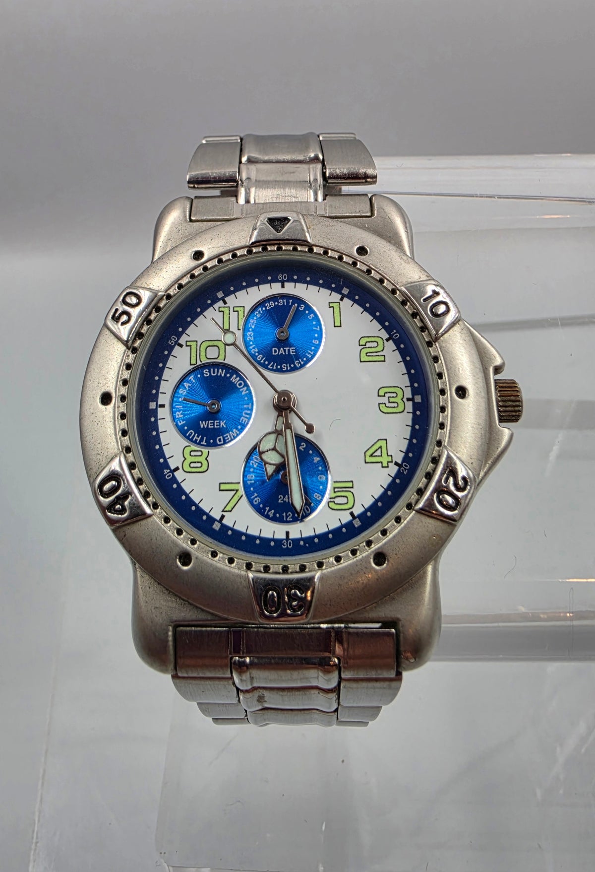 7" Silver Tone Blue Dial Day/Date/Seconds Hand Watch