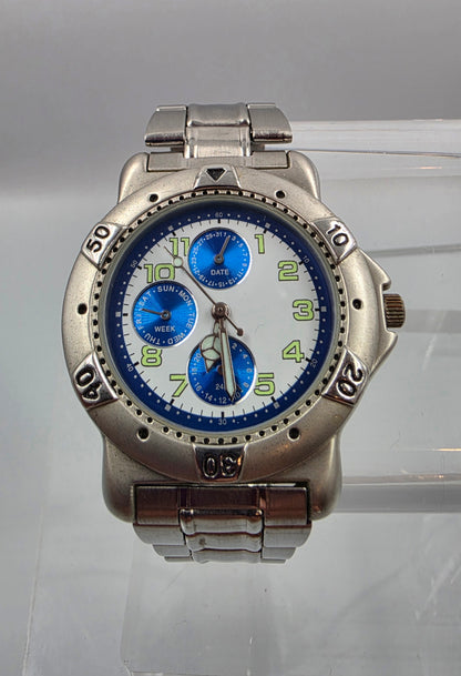 7" Silver Tone Blue Dial Day/Date/Seconds Hand Watch