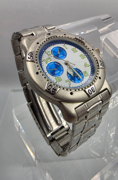 7" Silver Tone Blue Dial Day/Date/Seconds Hand Watch